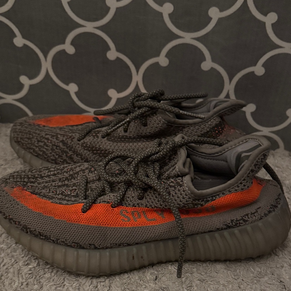 Yeezy Gray and Orange Athletic Shoes